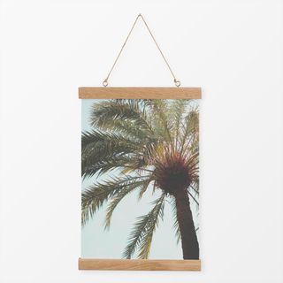 Textilposter Palmenblätter im Wind