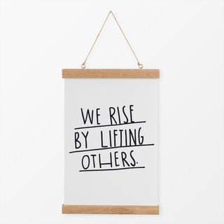 Textilposter We Rise By Lifting Others